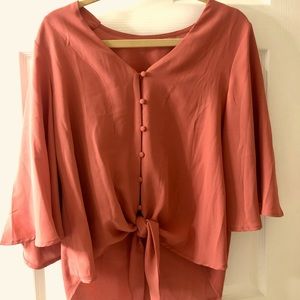 Peach blouse with tie. Size medium.